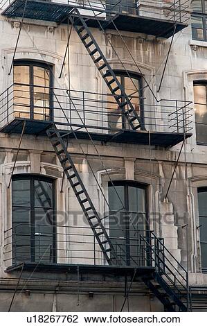 Stock Image - Fire escapes outside a building, Ville-Marie, Montreal, Quebec, Canada. Fotosearch