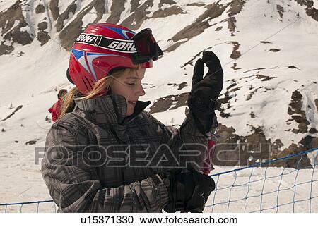 Girl getting prepared for skiing, Domaine De Balme, Vallorcine, Mont Blanc, Chamonix, Rhone-Alpes, France View Large Photo Image Stock Image - Girl getting prepared for skiing, Domaine De Balme, Vallorcine, Mont Blanc, Chamonix, Rhone-Alpes, France. Fotosearch