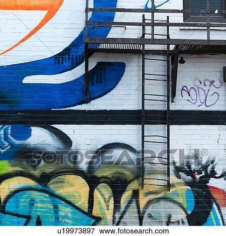 Graffiti covered wall of a building, Le Plateau-Mont-Royal, Montreal, Quebec, Canada View Large Photo Image Stock Photo - Graffiti covered wall of a building, Le Plateau-Mont-Royal, Montreal, Quebec, Canada. Fotosearch