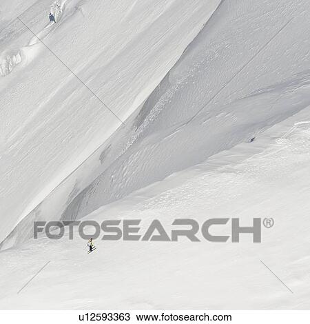 High angle view of a skier in action, Aiguille Du Midi, Mont Blanc, Chamonix, Rhone-Alpes, France View Large Photo Image Stock Image - High angle view of a skier in action, Aiguille Du Midi, Mont Blanc, Chamonix, Rhone-Alpes, France. Fotosearch