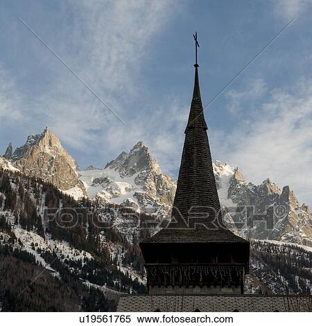 Stock Photography - La Chapelle Des Praz in Les Praz with the Aiguille Du Dru mountain in the background, Chamonix, Rhone-Alpes, France. Fotosearch