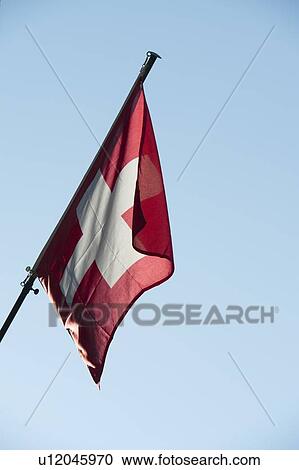 Low angle view of a Swiss Flag, Zermatt, Valais Canton, Switzerland View Large Photo Image Stock Image - Low angle view of a Swiss Flag, Zermatt, Valais Canton, Switzerland. Fotosearch