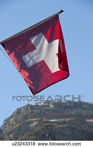 Low angle view of a Swiss Flag, Zermatt, Valais Canton, Switzerland View Large Photo Image Stock Photo - Low angle view of a Swiss Flag, Zermatt, Valais Canton, Switzerland. Fotosearch