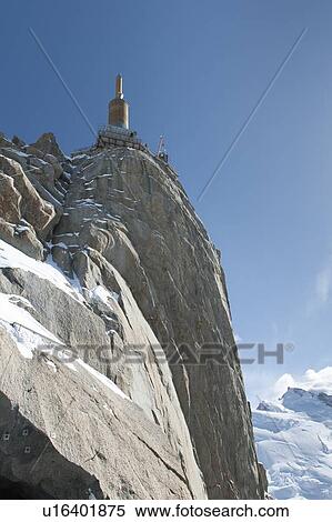 Low angle view of a tower on top of a mountain, Aiguille Du Midi, Mont Blanc, Chamonix, Rhone-Alpes, France View Large Photo Image Stock Photography - Low angle view of a tower on top of a mountain, Aiguille Du Midi, Mont Blanc, Chamonix, Rhone-Alpes, France. Fotosearch