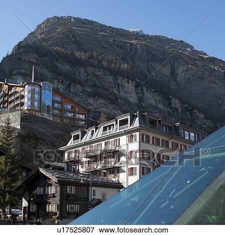 Stock Photo - Low angle view of buildings in a town, Zermatt, Valais Canton, Switzerland. Fotosearch