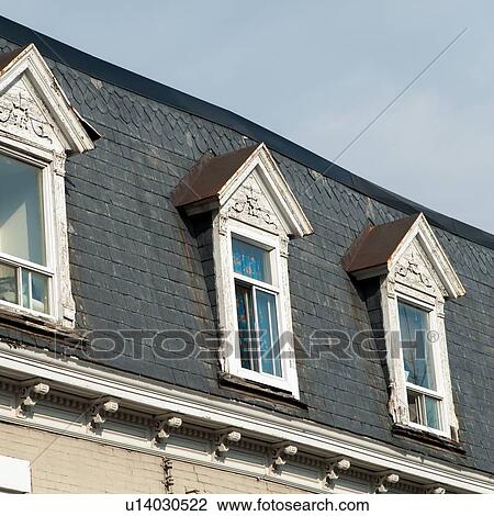 Low angle view of dormers in a traditional house, Le Plateau-Mont-Royal, Montreal, Quebec, Canada View Large Photo Image Stock Image - Low angle view of dormers in a traditional house, Le Plateau-Mont-Royal, Montreal, Quebec, Canada. Fotosearch