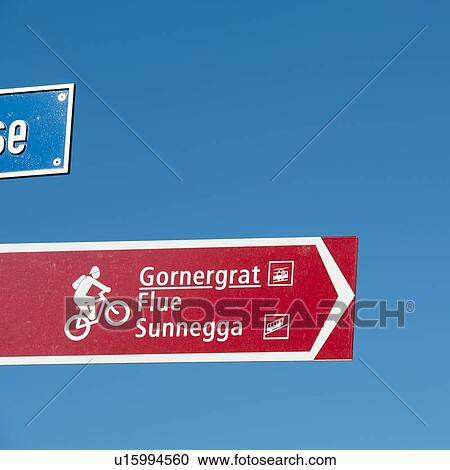 Stock Image - Low angle view of road signs, Zermatt, Valais Canton, Switzerland. Fotosearch