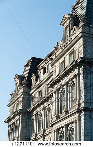 Stock Image - Low angle view of the Montreal City Hall, Ville-Marie, Montreal, Quebec, Canada. Fotosearch