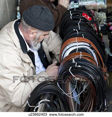 Man selling belts, Istanbul, Turkey View Large Photo Image Stock Image - Man selling belts, Istanbul, Turkey. Fotosearch