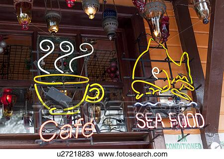 Neon sign on the glass of a restaurant, Istanbul, Turkey View Large Photo Image Stock Image - Neon sign on the glass of a restaurant, Istanbul, Turkey. Fotosearch