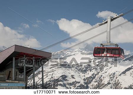 Stock Image - Overhead cable car, Zermatt, Valais Canton, Switzerland. Fotosearch