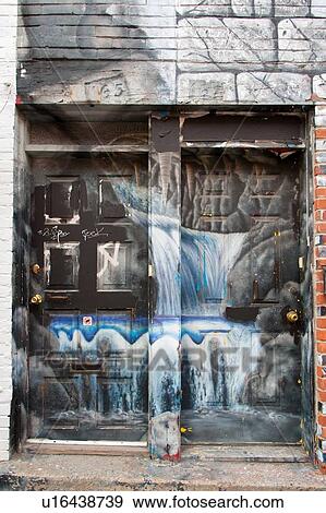 Stock Photo - Painted door of a building, Mile-End, Montreal, Quebec, Canada. Fotosearch