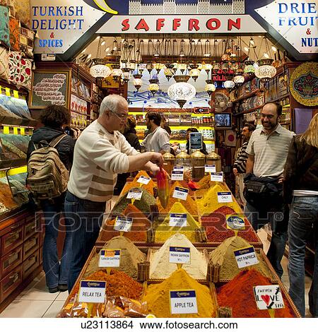 People buying spices from spice bazar, Grand Bazaar, Istanbul, Turkey View Large Photo Image Picture - People buying spices from spice bazar, Grand Bazaar, Istanbul, Turkey. Fotosearch