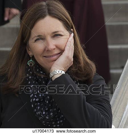 Stock Image - Portrait of a woman smiling, Topkapi Palace, Istanbul, Turkey. Fotosearch