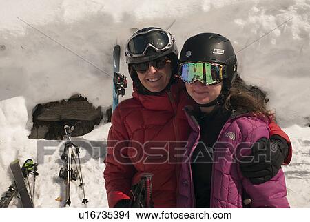 Picture - Portrait of mother and daughter in ski-wear at ski resort, Domaine De Balme, Vallorcine, Mont Blanc, Chamonix, Rhone-Alpes, France. Fotosearch