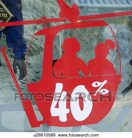 Sale discount percentage sign on the window of a store, Chamonix, Rhone-Alpes, France View Large Photo Image Stock Photo - Sale discount percentage sign on the window of a store, Chamonix, Rhone-Alpes, France. Fotosearch