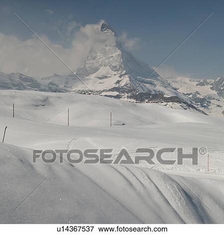 Ski area with mountain in winter, Mt Matterhorn, Zermatt, Valais Canton, Switzerland View Large Photo Image Stock Photo - Ski area with mountain in winter, Mt Matterhorn, Zermatt, Valais Canton, Switzerland. Fotosearch