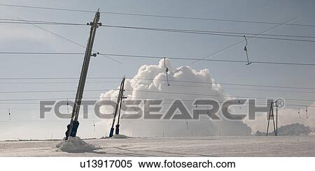 Ski lift cables in the snow covered valley, Zermatt, Valais Canton, Switzerland View Large Photo Image Stock Photography - Ski lift cables in the snow covered valley, Zermatt, Valais Canton, Switzerland. Fotosearch
