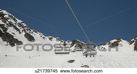 Ski lifts on snow covered mountains, Brevent, Flegere, Mont Blanc, Chamonix, Rhone-Alpes, France View Large Photo Image Stock Photography - Ski lifts on snow covered mountains, Brevent, Flegere, Mont Blanc, Chamonix, Rhone-Alpes, France. Fotosearch