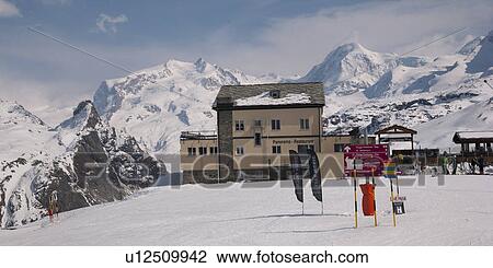 Ski resort in a snowy valley, Zermatt, Valais Canton, Switzerland View Large Photo Image Stock Image - Ski resort in a snowy valley, Zermatt, Valais Canton, Switzerland. Fotosearch