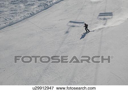 Skier in action at Les Grands Montets ski area, Mont Blanc, Chamonix, Rhone-Alpes, France View Large Photo Image Stock Photo - Skier in action at Les Grands Montets ski area, Mont Blanc, Chamonix, Rhone-Alpes, France. Fotosearch