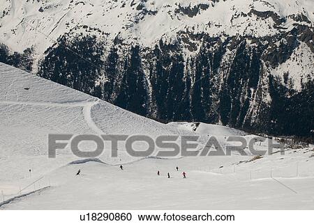 Skiers in action at Les Grands Montets ski area, Mont Blanc, Chamonix, Rhone-Alpes, France View Large Photo Image Stock Image - Skiers in action at Les Grands Montets ski area, Mont Blanc, Chamonix, Rhone-Alpes, France. Fotosearch