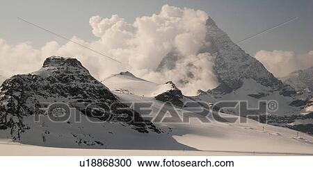 Snow covered mountains in winter, Mt Matterhorn, Zermatt, Valais Canton, Switzerland View Large Photo Image Stock Image - Snow covered mountains in winter, Mt Matterhorn, Zermatt, Valais Canton, Switzerland. Fotosearch