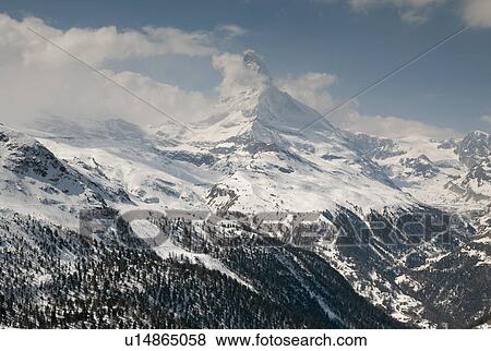 Stock Photo - Snow covered mountains in winter, Mt Matterhorn, Zermatt, Valais Canton, Switzerland. Fotosearch