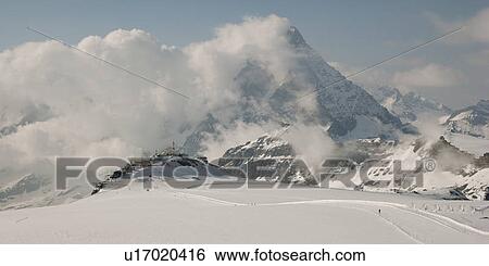 Stock Photograph - Snow covered mountains in winter, Mt Matterhorn, Zermatt, Valais Canton, Switzerland. Fotosearch