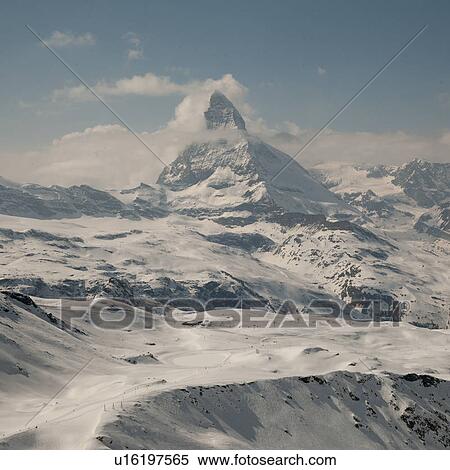 Snow covered mountains in winter, Mt Matterhorn, Zermatt, Valais Canton, Switzerland View Large Photo Image Stock Photography - Snow covered mountains in winter, Mt Matterhorn, Zermatt, Valais Canton, Switzerland. Fotosearch