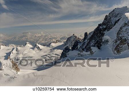 Snow covered mountains in winter, Aiguille Du Midi, Mont Blanc, Chamonix, Rhone-Alpes, France View Large Photo Image Picture - Snow covered mountains in winter, Aiguille Du Midi, Mont Blanc, Chamonix, Rhone-Alpes, France. Fotosearch