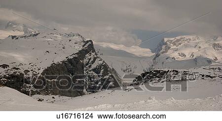 Snow covered mountains in winter, Zermatt, Valais Canton, Switzerland View Large Photo Image Picture - Snow covered mountains in winter, Zermatt, Valais Canton, Switzerland. Fotosearch