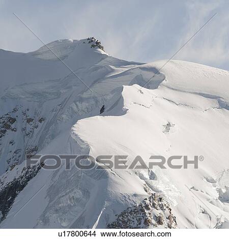Picture - Snow covered mountains in winter, Aiguille Du Midi, Mont Blanc, Chamonix, Rhone-Alpes, France. Fotosearch