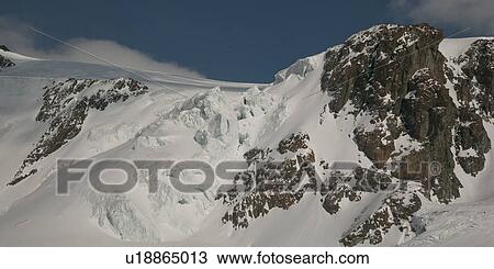Snow covered mountains in winter, Zermatt, Valais Canton, Switzerland View Large Photo Image Stock Image - Snow covered mountains in winter, Zermatt, Valais Canton, Switzerland. Fotosearch