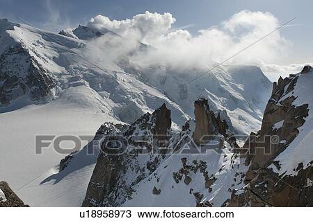 Snow covered mountains in winter, Aiguille Du Midi, Mont Blanc, Chamonix, Rhone-Alpes, France View Large Photo Image Stock Image - Snow covered mountains in winter, Aiguille Du Midi, Mont Blanc, Chamonix, Rhone-Alpes, France. Fotosearch