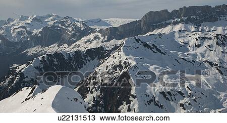 Stock Image - Snow covered mountains in winter, Brevent, Flegere, Mont Blanc, Chamonix, Rhone-Alpes, France. Fotosearch