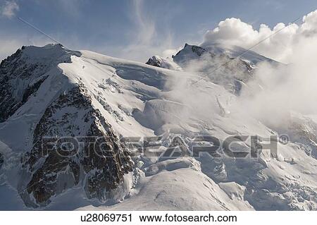 Snow covered mountains in winter, Aiguille Du Midi, Mont Blanc, Chamonix, Rhone-Alpes, France View Large Photo Image Stock Image - Snow covered mountains in winter, Aiguille Du Midi, Mont Blanc, Chamonix, Rhone-Alpes, France. Fotosearch