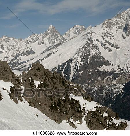 Stock Photo - Snow covered mountains in winter, Brevent, Flegere, Mont Blanc, Chamonix, Rhone-Alpes, France. Fotosearch