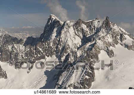 Snow covered mountains in winter, Aiguille Du Midi, Mont Blanc, Chamonix, Rhone-Alpes, France View Large Photo Image Stock Photo - Snow covered mountains in winter, Aiguille Du Midi, Mont Blanc, Chamonix, Rhone-Alpes, France. Fotosearch