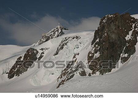 Snow covered mountains in winter, Zermatt, Valais Canton, Switzerland View Large Photo Image Stock Photograph - Snow covered mountains in winter, Zermatt, Valais Canton, Switzerland. Fotosearch