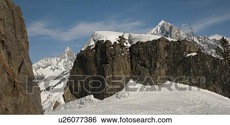 Stock Photograph - Snow covered mountains in winter, Brevent, Flegere, Mont Blanc, Chamonix, Rhone-Alpes, France. Fotosearch