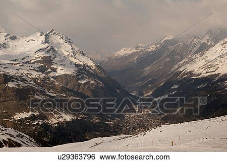 Snow covered mountains in winter, Zermatt, Valais Canton, Switzerland View Large Photo Image Stock Photograph - Snow covered mountains in winter, Zermatt, Valais Canton, Switzerland. Fotosearch