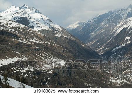 Snow covered mountains in winter, Zermatt, Valais Canton, Switzerland View Large Photo Image Stock Photography - Snow covered mountains in winter, Zermatt, Valais Canton, Switzerland. Fotosearch