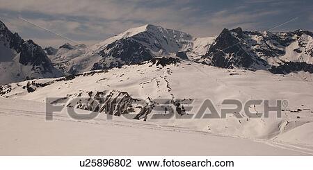Stock Image - Snow covered ski area in winter, Domaine De Balme, Vallorcine, Mont Blanc, Chamonix, Rhone-Alpes, France. Fotosearch
