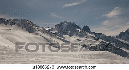 Snow covered ski area with mountains in winter, Domaine De Balme, Vallorcine, Mont Blanc, Chamonix, Rhone-Alpes, France View Large Photo Image Stock Image - Snow covered ski area with mountains in winter, Domaine De Balme, Vallorcine, Mont Blanc, Chamonix, Rhone-Alpes, France. Fotosearch