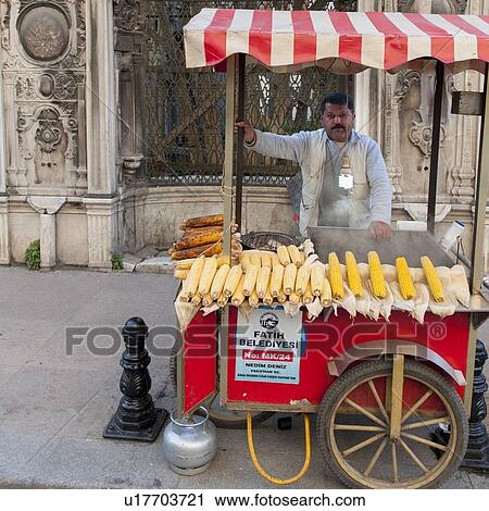 Street vendor selling corn cobs, Istanbul, Turkey View Large Photo Image Stock Image - Street vendor selling corn cobs, Istanbul, Turkey. Fotosearch