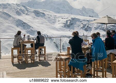 Tourists at a resort in the snowy valley, Zermatt, Valais Canton, Switzerland View Large Photo Image Stock Image - Tourists at a resort in the snowy valley, Zermatt, Valais Canton, Switzerland. Fotosearch