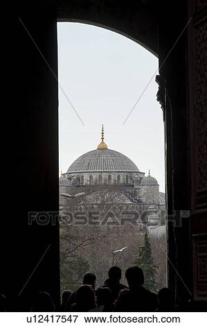 Stock Photo - Tourists looking at Blue Mosque, Istanbul, Turkey. Fotosearch