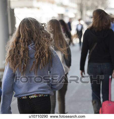 Stock Image - Tourists walking on a street, Bahnhofstrasse, Zurich, Switzerland. Fotosearch