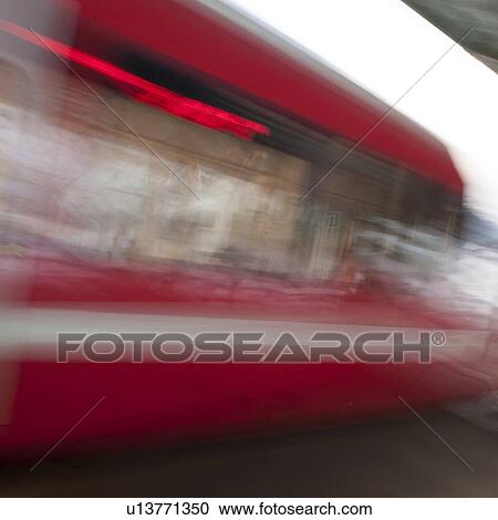 Stock Image - Train moving at a station, Chamonix, Rhone-Alpes, France. Fotosearch